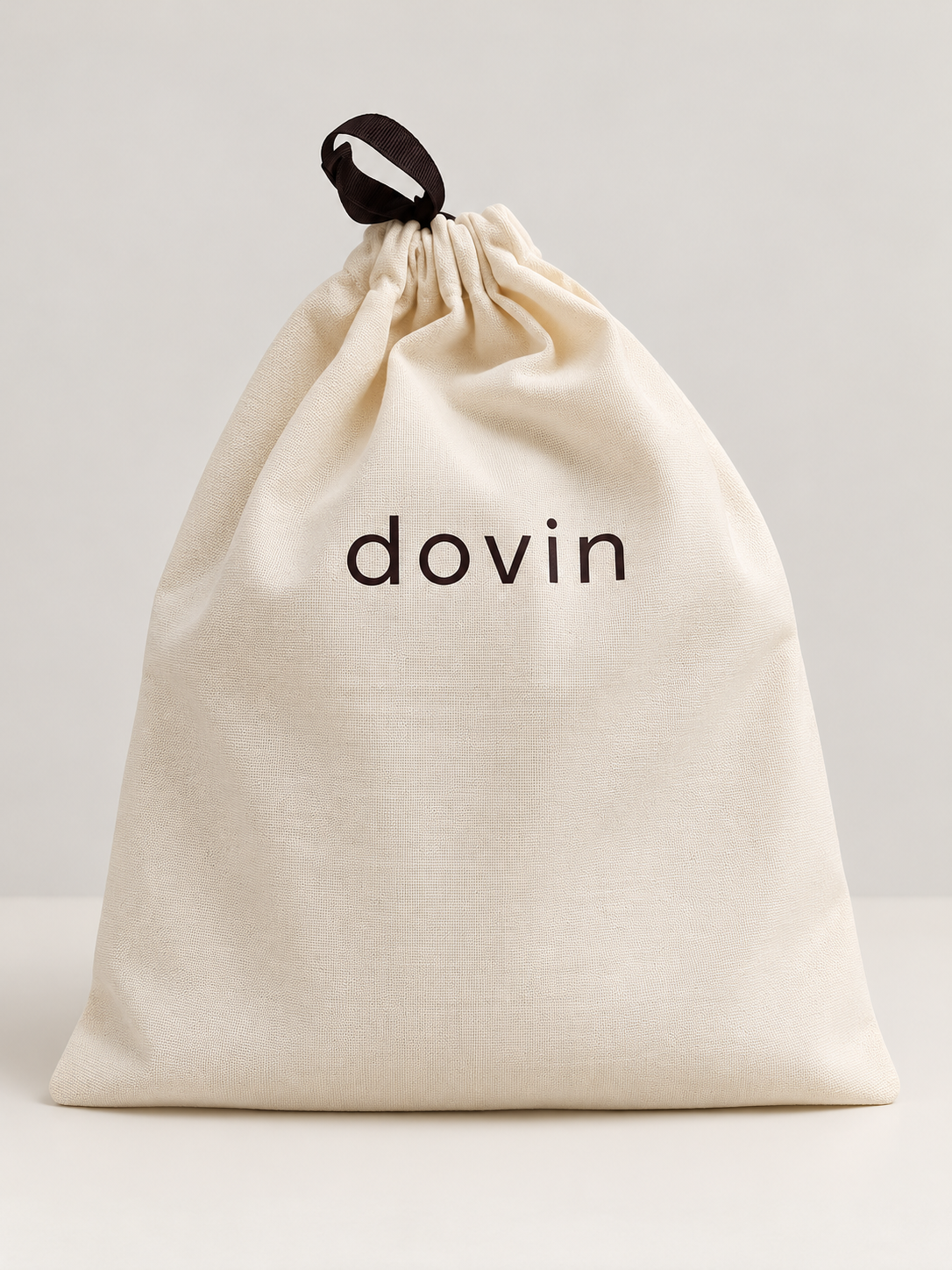 Included dovin reusable drawstring pouch — edited product image